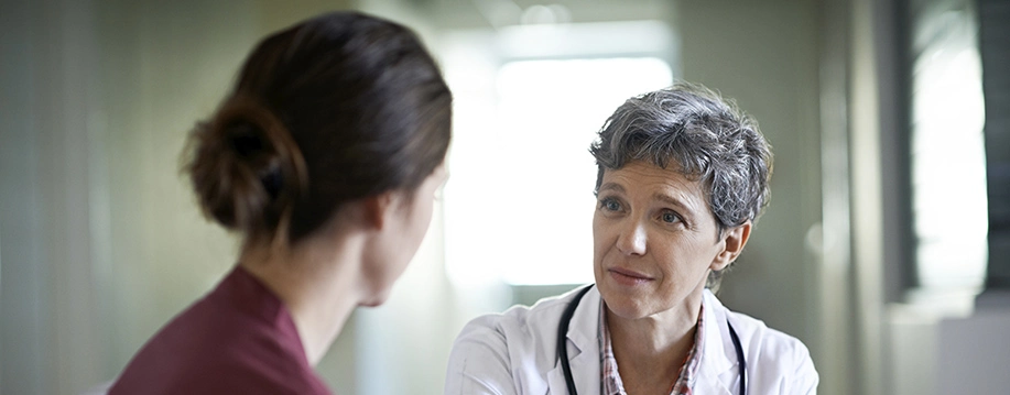 Female doctor consults female patient
