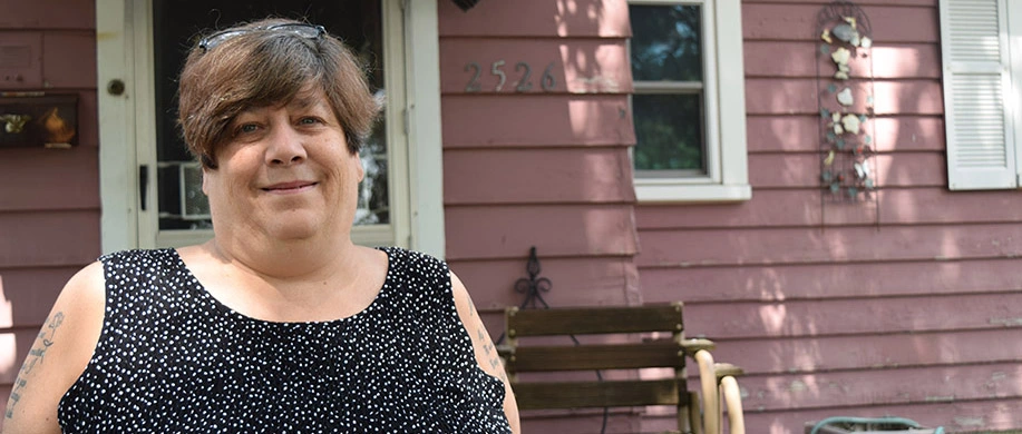 Dorothy in front of her house